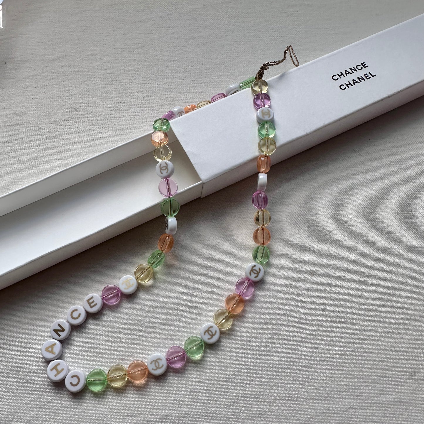 Chanel chance perfume phone charm