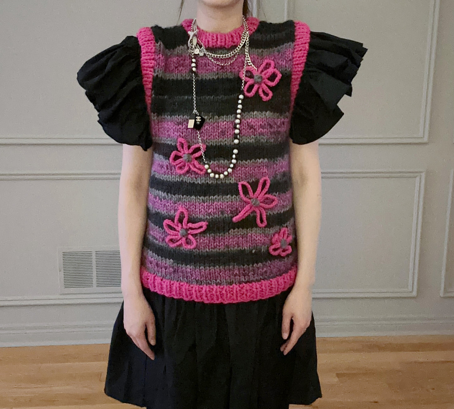 Hand knit flower vest